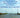 Understanding the Long-Term Evolution of the Coupled Natural-Human Coastal System